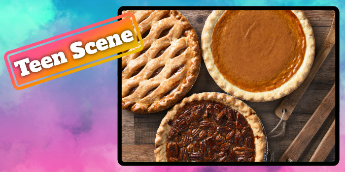 Three types of Thanksgiving style pies on a wooden table.